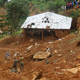 Security forces search for bodies. (AP Photo/ Manika Kamara)